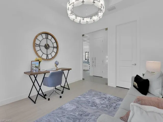 Guest Bedroom 1 / Office with Frameless Glass Doors
