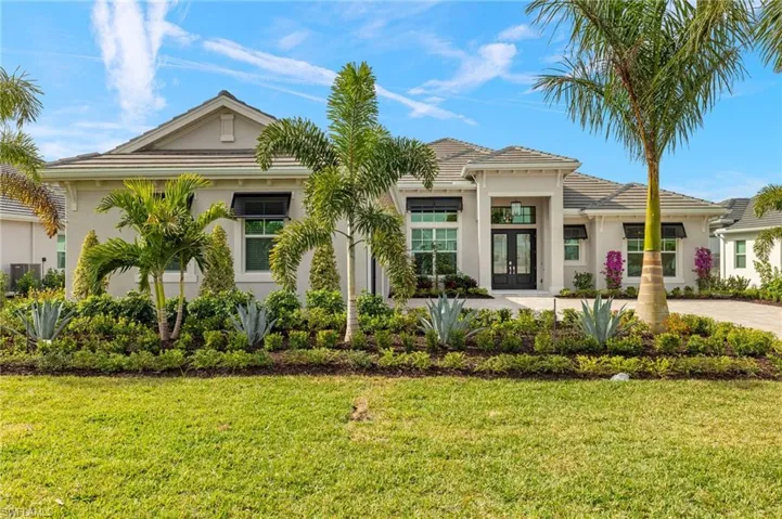 New Giant Palm Trees, Pristine Landscaping, & Awnings, & Tile Entry