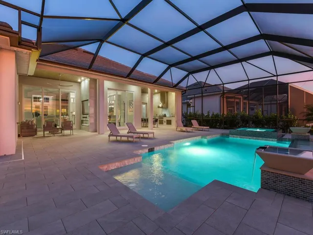 Gas Heated Pool & Spa, Sun Shelf, Picture Screening Lanai, Privacy Calusa Hedges, Summer Kitchen, Built-in Entertainment Center & Beautiful View of the 580-Acre Boatable Lake