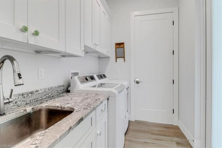 Laundry Room with Sink & Built-In Cabinets