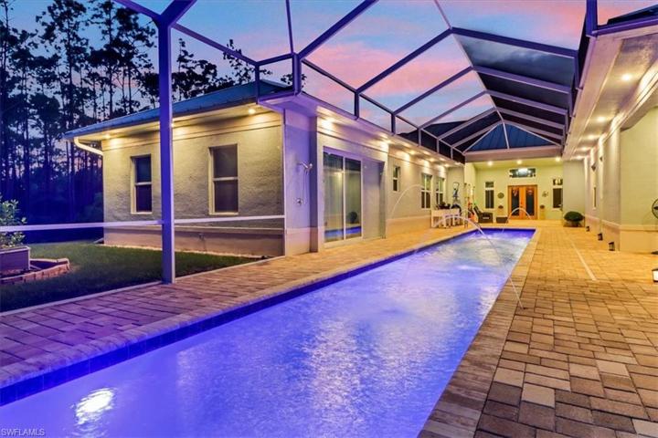 The Courtyard Features Recessed Lighting and an Outdoor Shower