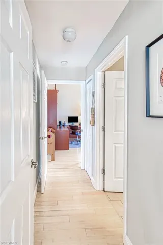 Hall featuring light wood-style floors