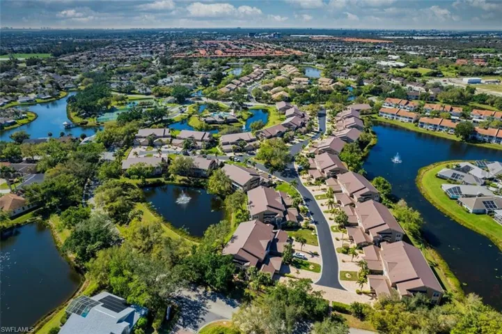 Drone / aerial view featuring a residential view and a water view