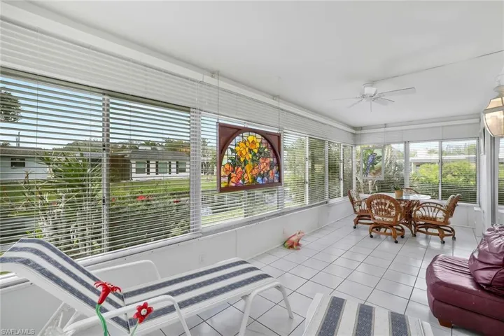 Sunroom / solarium with ceiling fan