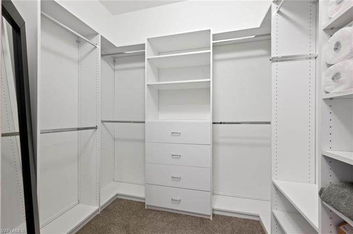 Master closet  with Closet built ins for organization
