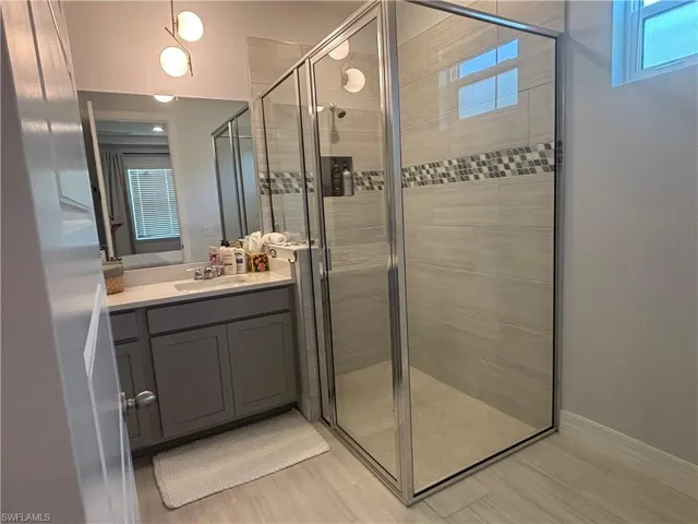 Master Bathroom with walk in shower and double vanity