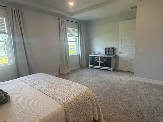 Master Bedroom with large area for dressers and sitting area.