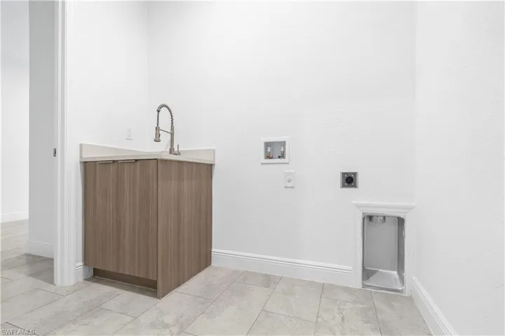 Laundry area featuring washer hookup and hookup for an electric dryer