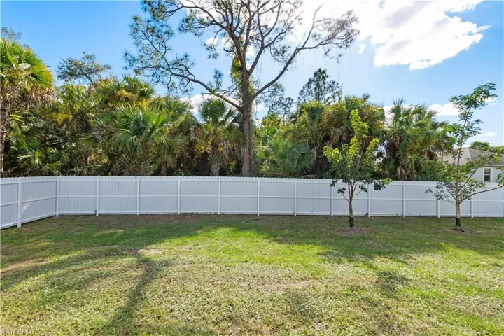 View of fenced backyard