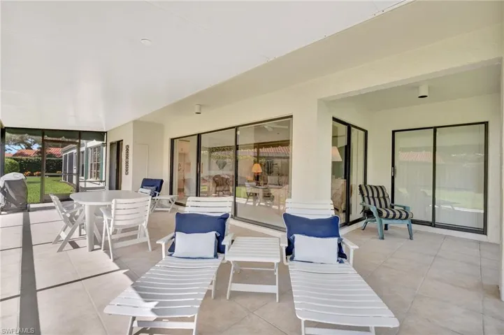 View of patio with outdoor dining area