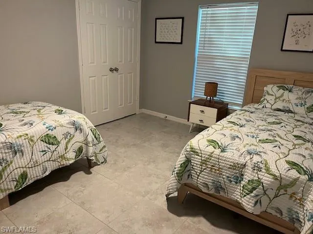 Bedroom featuring baseboards