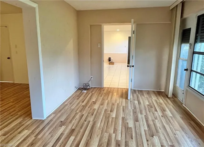 Spare room with light hardwood / wood-style floors