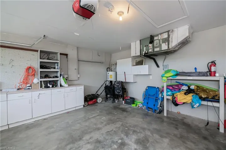 Cabinets and shelves in garage for added storage