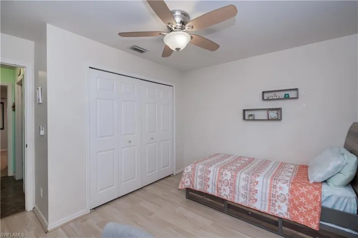 2nd guest room with twin bed and large guest closet