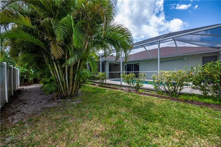 Lush, mature landscaping in your fully fenced backyard