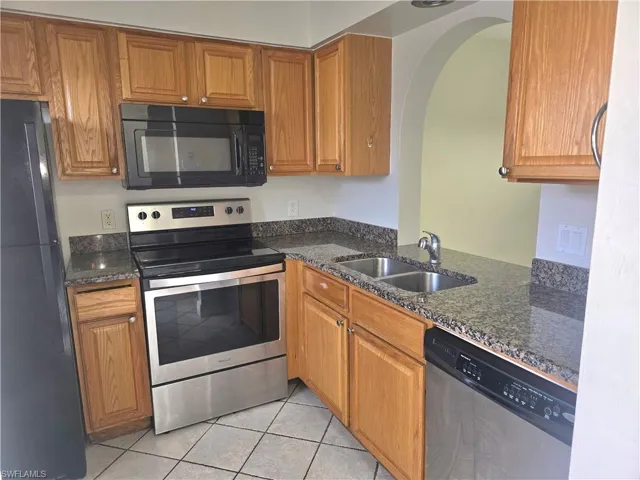 SS stove, microwave & dishwasher. Black refrigerator with no ice/water.