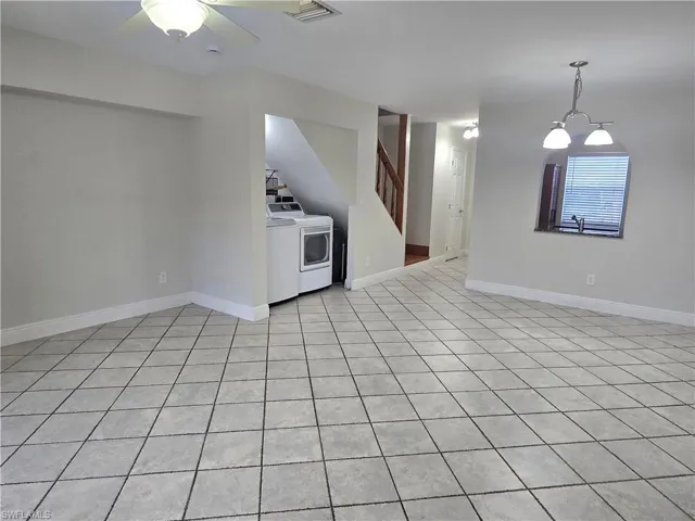 Tiled Great room. Laundry & Hot Water Heater.