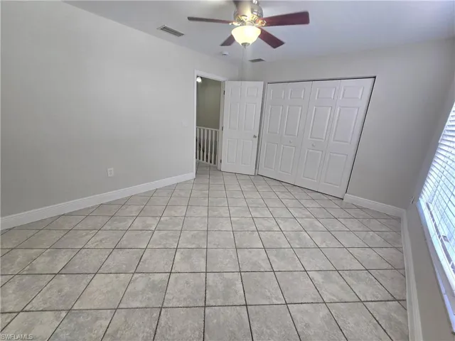 2nd bedroom with closet width of room.