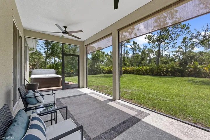 Screened Lanai featuring ceiling fan