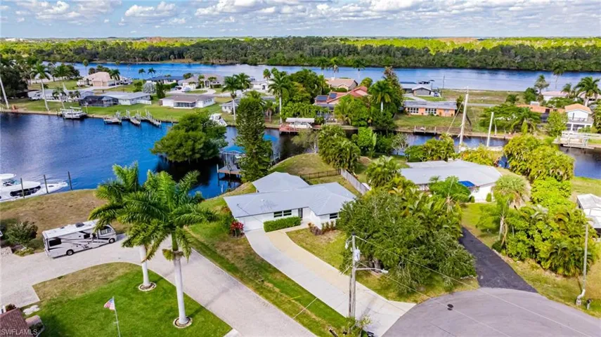 Aerial view of residential area with a large body of water