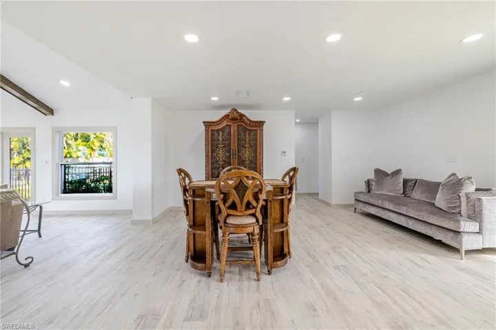 Dining space featuring recessed lighting and light wood-type flooring