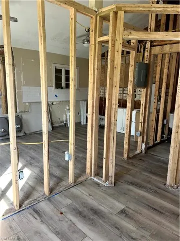Misc room with wood-type flooring
