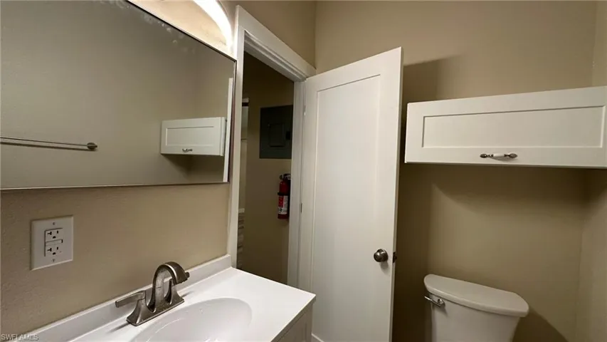 Bathroom featuring toilet and sink