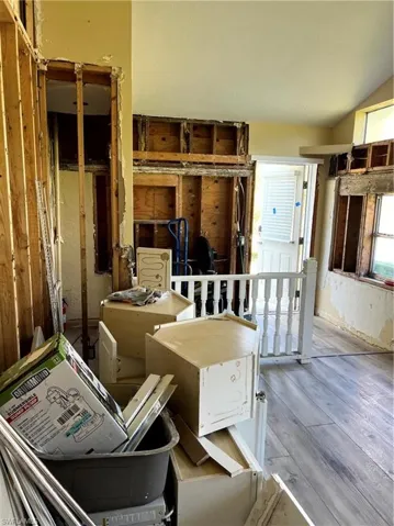 Miscellaneous room with hardwood / wood-style flooring