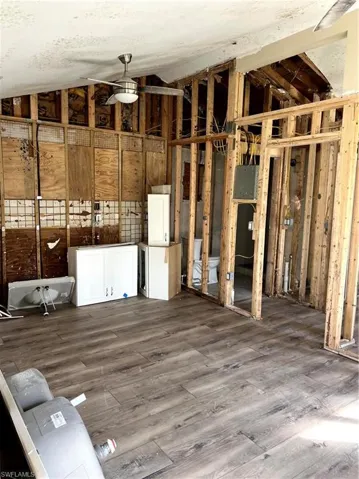 Miscellaneous room featuring hardwood / wood-style flooring