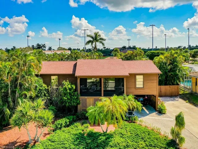 Ranch-style house with a carport