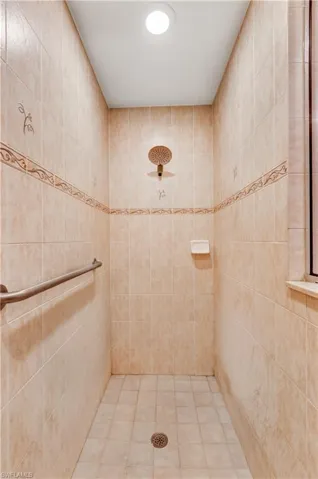 Bathroom with a tile shower