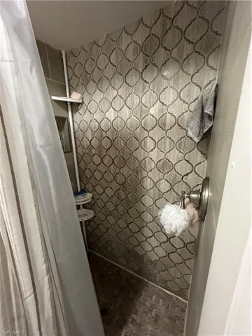 Bathroom with tiled shower