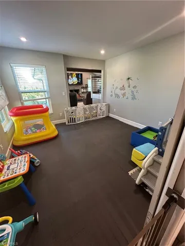 Game room with recessed lighting and rubber floors