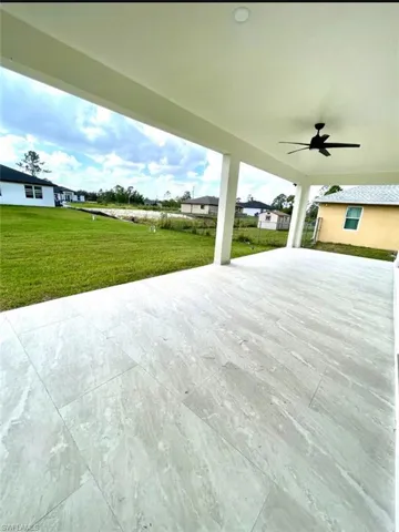 View of patio with ceiling fan