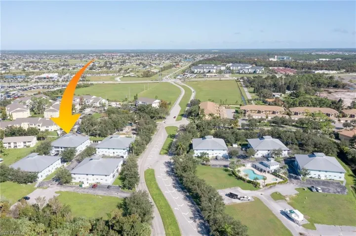 View of property location with nearby suburban area