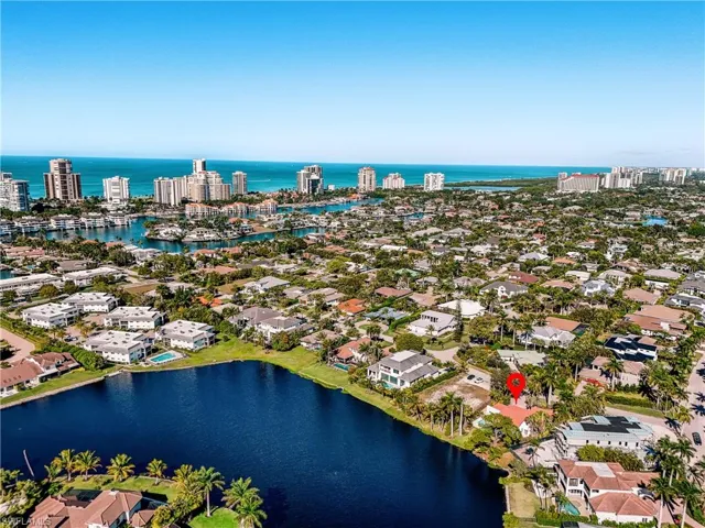 View of urban area featuring a large body of water and nearby suburban area