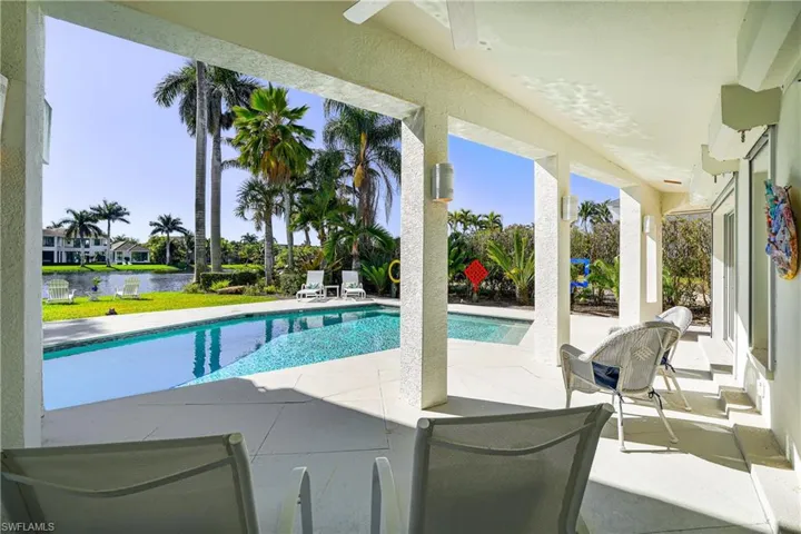 Swimming pool with a patio area