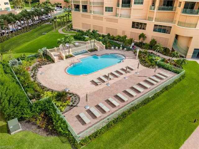 View of pool featuring a lawn and a patio area
