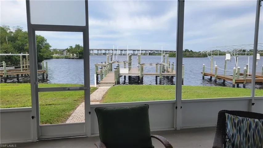 View from River side sunroom / solarium with a water view