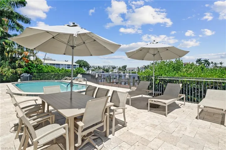 View of patio featuring outdoor dining area
