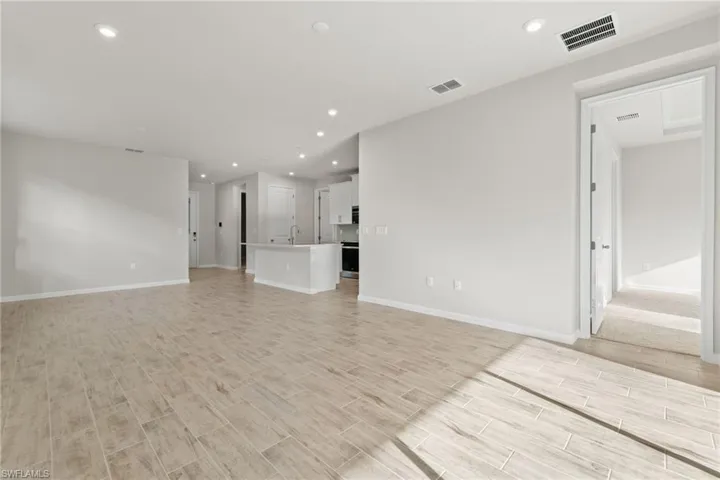 Great Room View of Kitchen and Dining