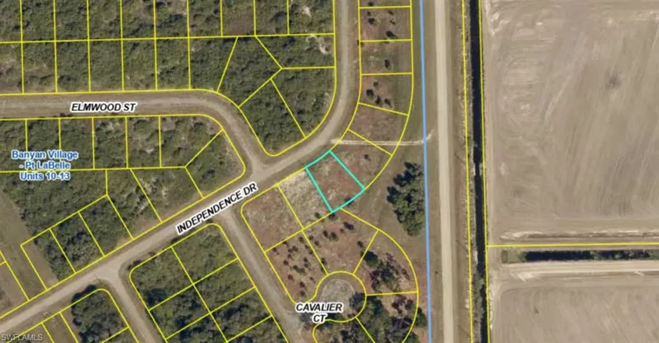 Aerial overview of property's location with property parcel outlined