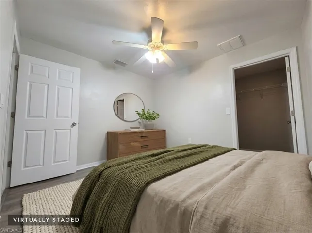 Bedroom 3 w/ Ceiling fan with integrated lighting and large bwalkin closet.