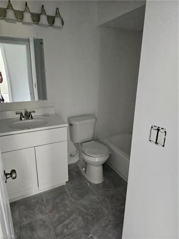 Bathroom #2 - New Drywall, New Flooring, New Baseboards, New Tub, New Toilet, New Lighting, New Fixtures.
