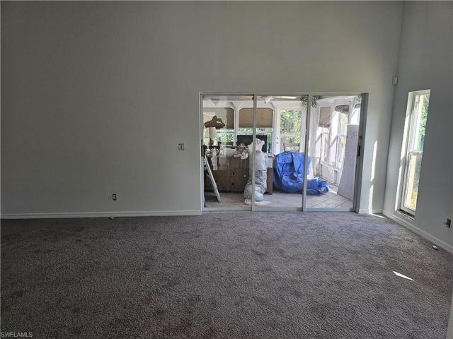 View #1 - New Drywall, New Flooring, New Baseboards.
