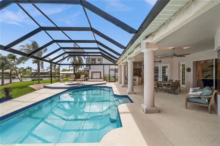 Large covered lanai steps from the pool