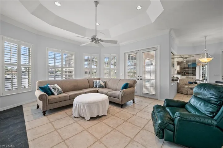 A long wall of windows in the family room for lots of light and fantastic canal views!