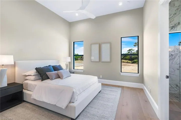 Bedroom featuring light wood-style floors and ceiling fan