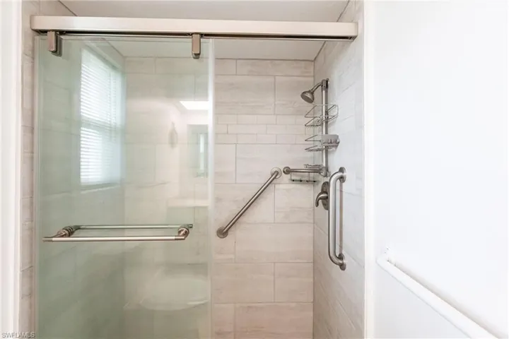 Bathroom featuring an enclosed shower
