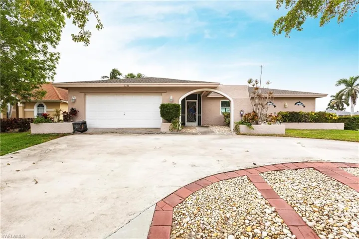 Single story home featuring a garage